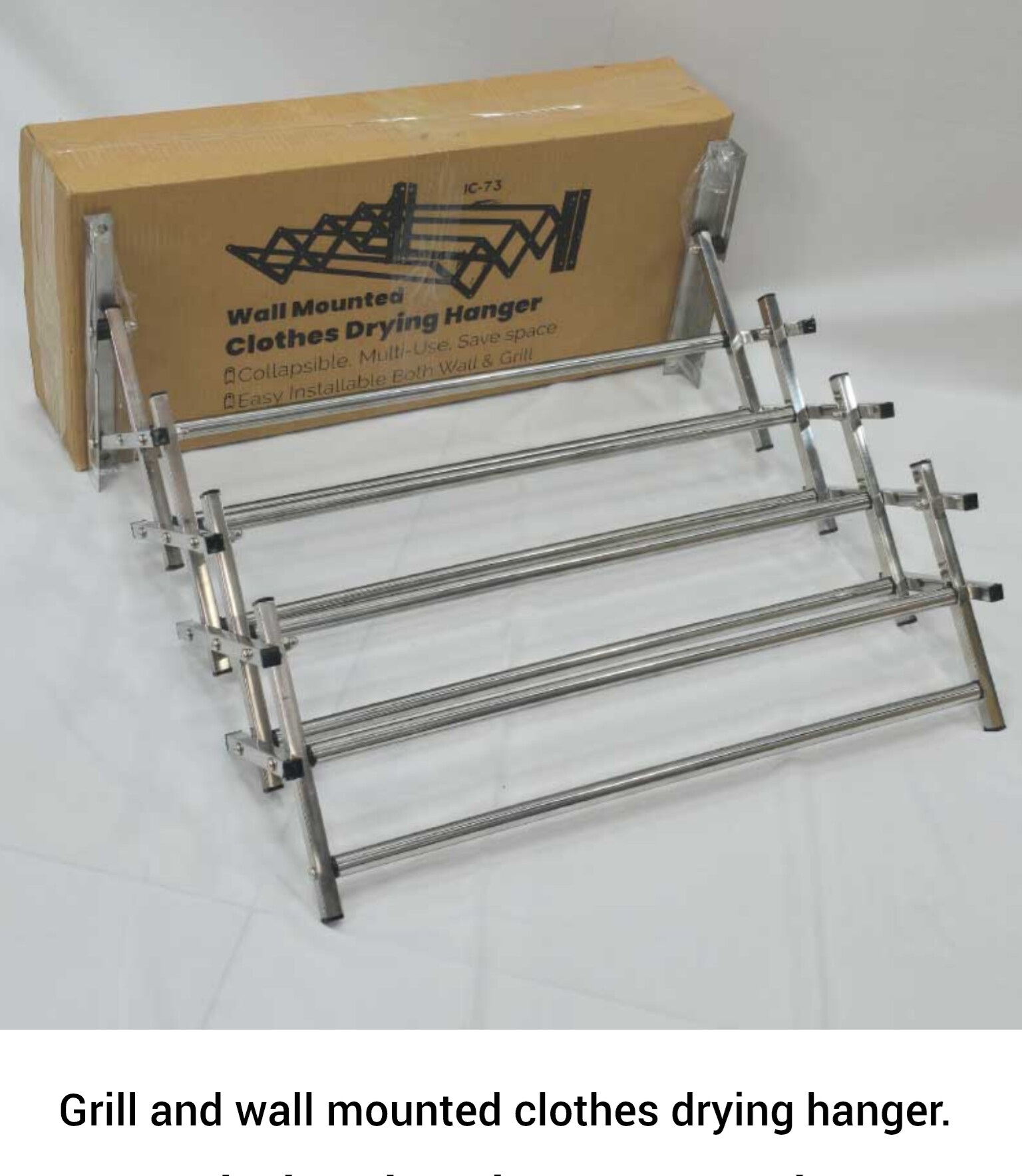 Grill and wall mounted clothes drying hanger