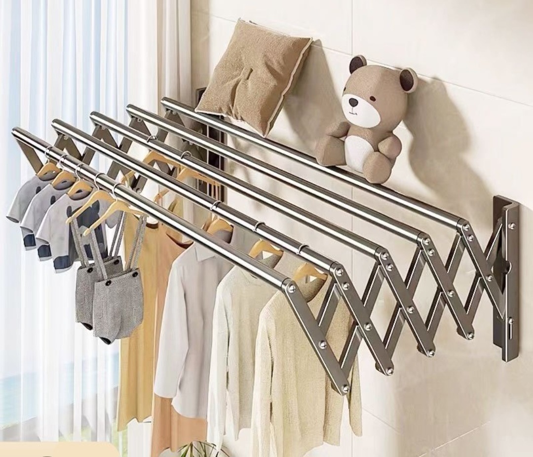 Grill and wall mounted clothes drying hanger
