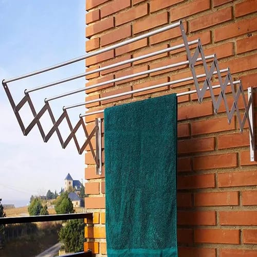 Grill and wall mounted clothes drying hanger
